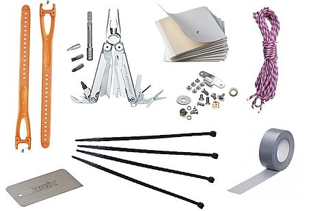 Einige der wichtigsten Gegenstände im Ausrüstungsset für Reparaturen auf Skitouren. Einige der wichtigsten Gegenstände im Ausrüstungsset für Reparaturen auf Skitouren.